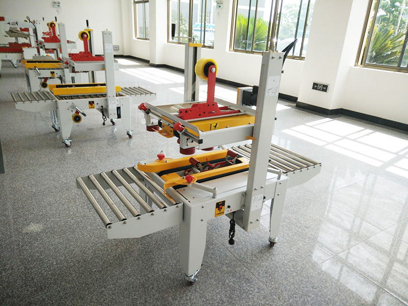 JS-FX500C 上下驅(qū)動手動折蓋膠帶封箱機(jī)